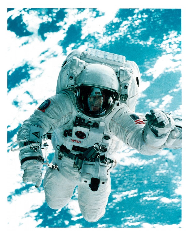NASA astronaut wearing the Speedmaster on the sleeve of his spacesuit 